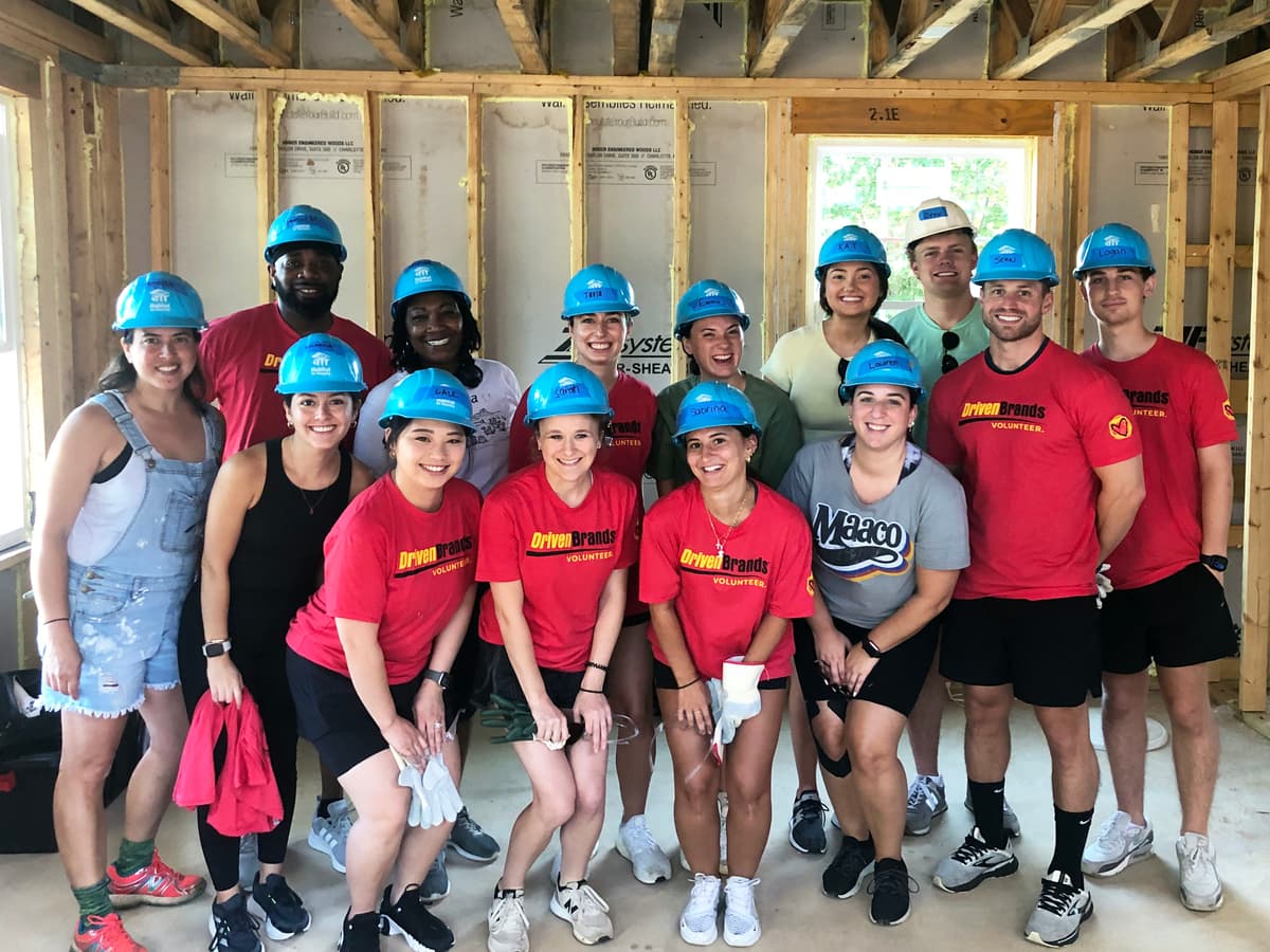 Driven employees and interns at Charlotte Habitat for Humanity build